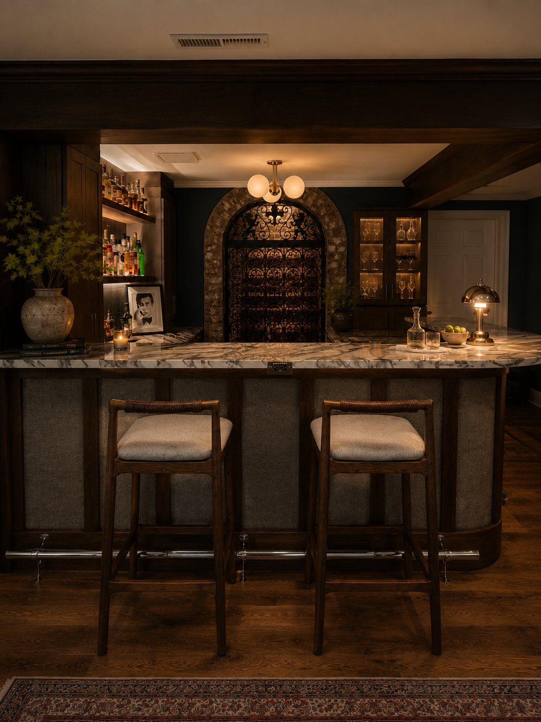 Dark panelled bar with marble counter and brass lamp