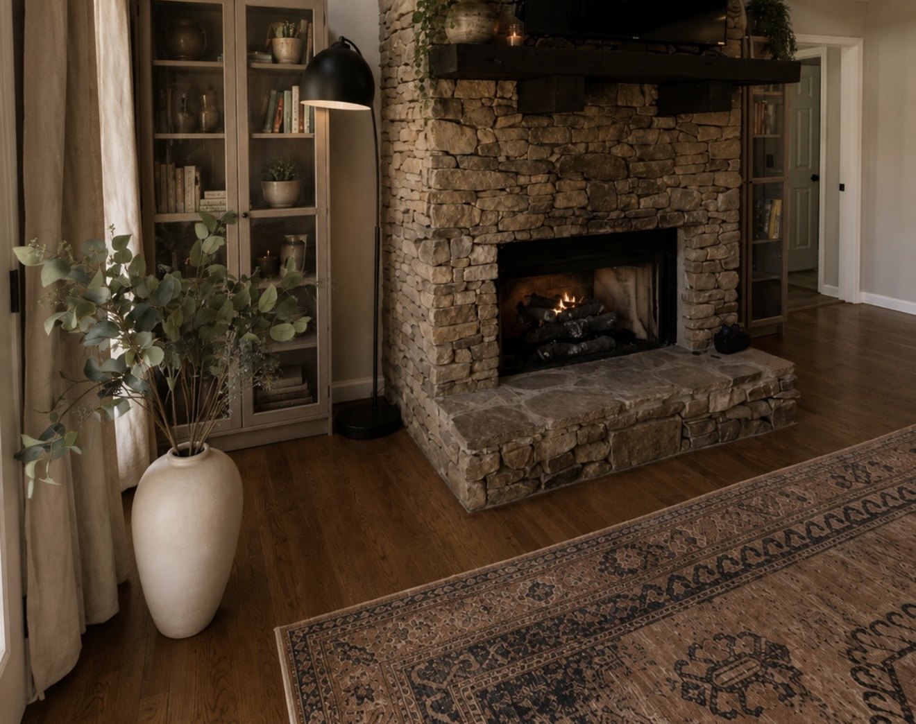 Great room beneath a vaulted ceiling